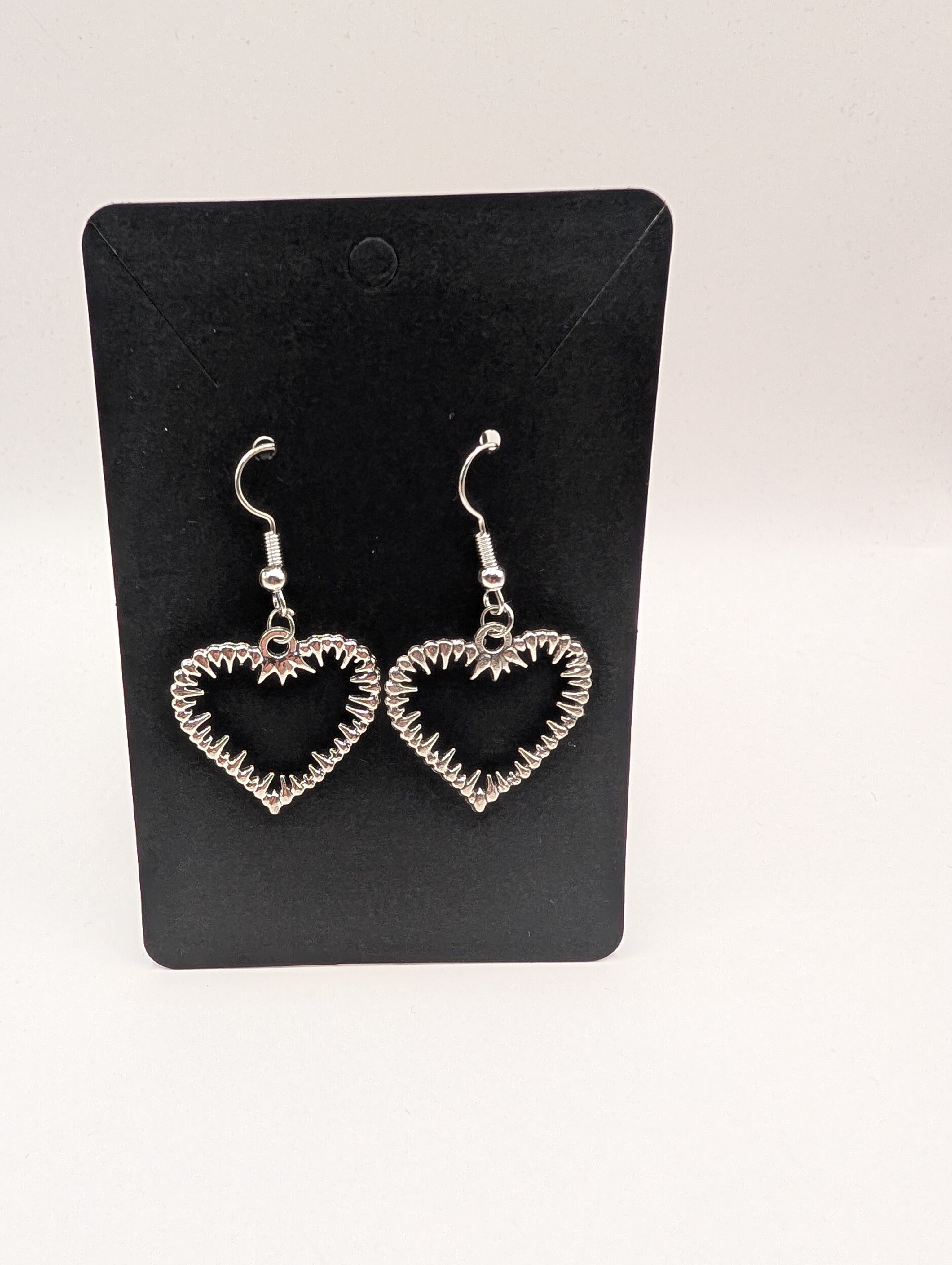 Spiky Shark Tooth Heart Earrings